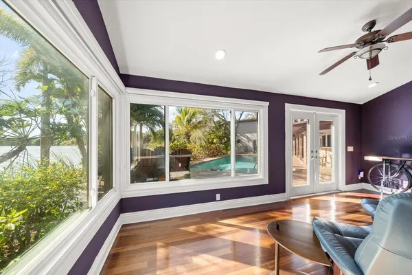 a view of a balcony with chairs