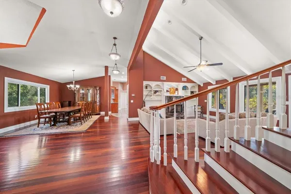 a view of a backyard both side of the house