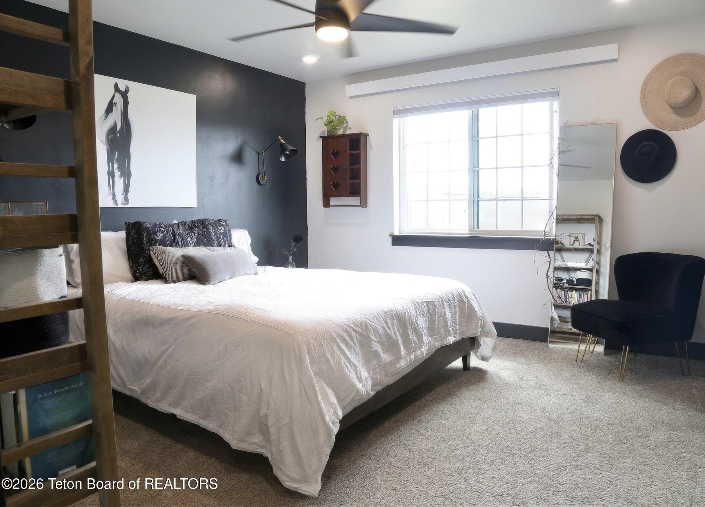 215 Little Greys Loop Etna, WY 83118 - Photo 12 of 20 Master bedroom