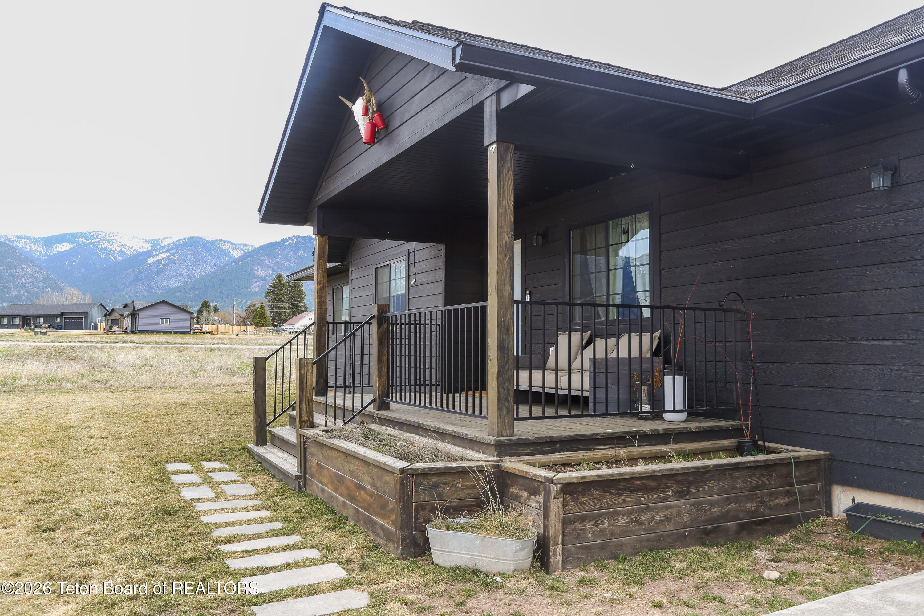 215 Little Greys Loop Etna, WY 83118 - Photo 20 of 20 Front porch east view