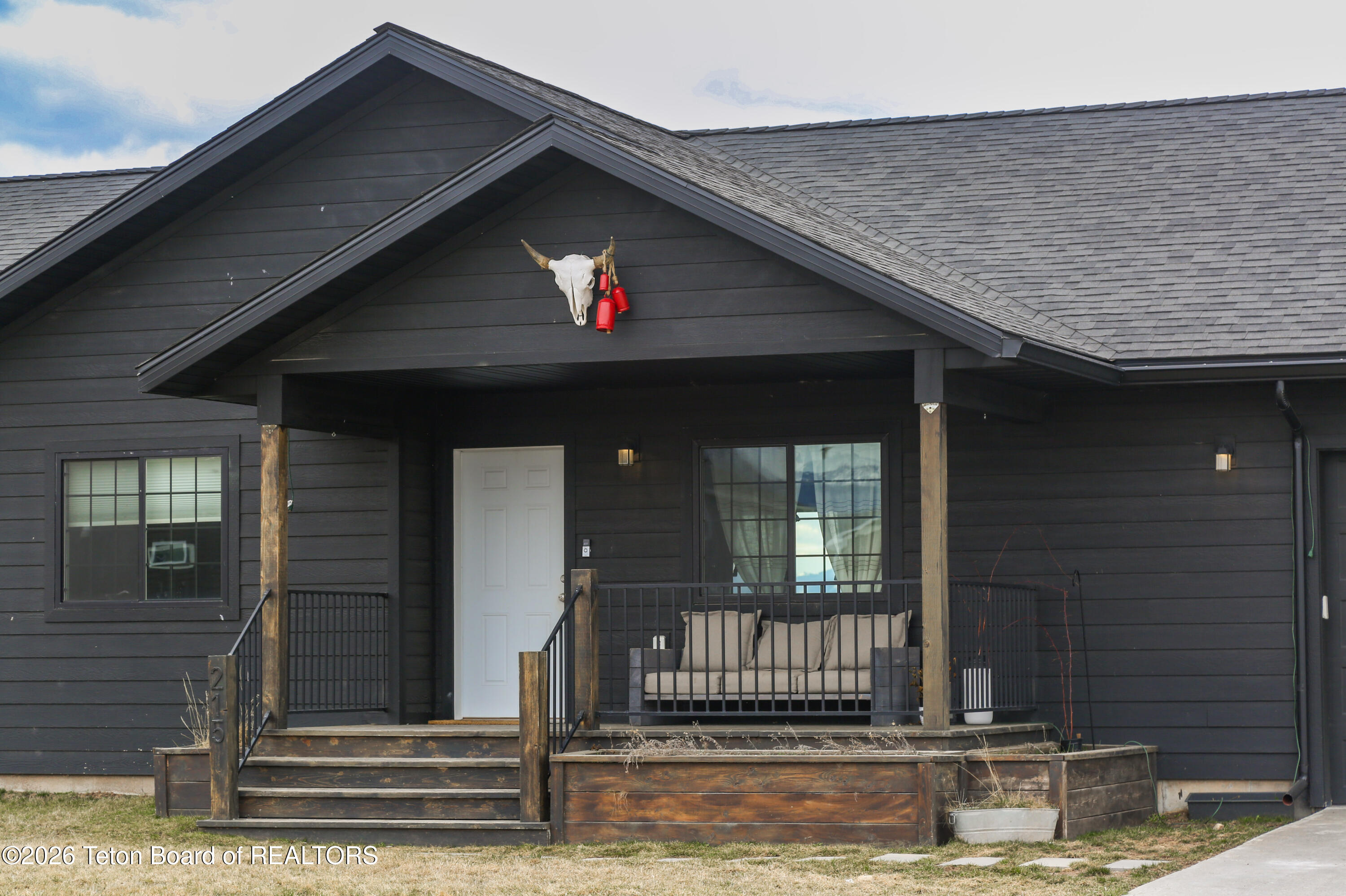 215 Little Greys Loop Etna, WY 83118 - Photo 3 of 20 Porch/ Front door
