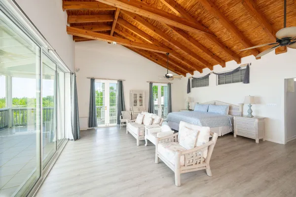 a bathroom with a sink a mirror and a bathtub