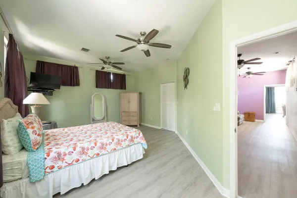 a view of a lake with a table and chairs