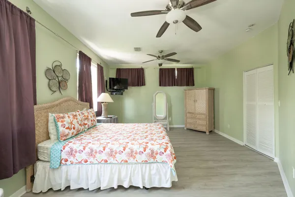 an aerial view of a house with a garden