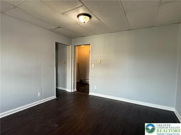 a bathroom with a toilet and shower