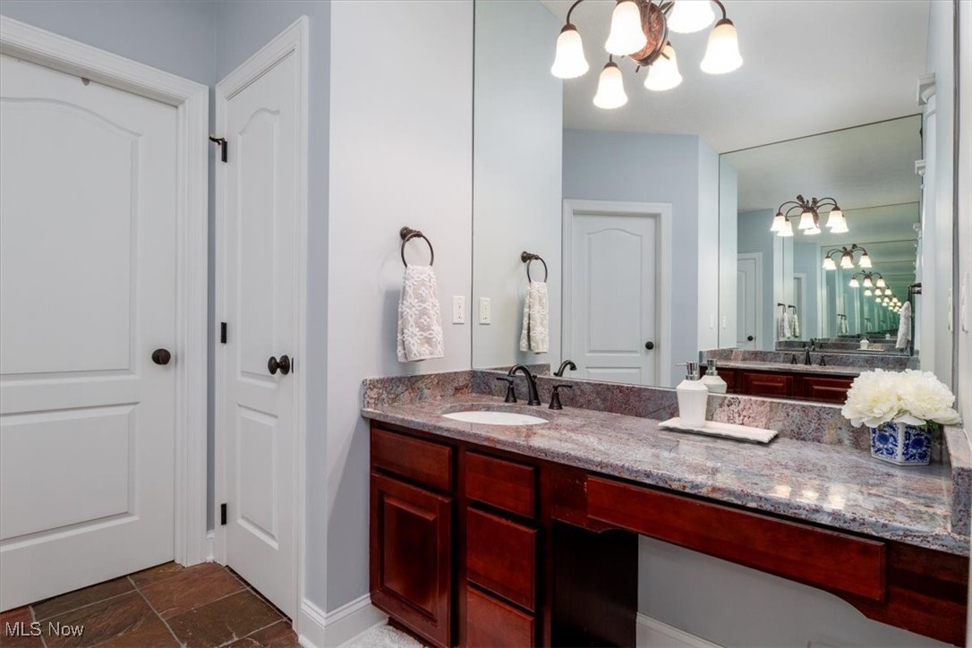 4679 Paxton Road Akron, OH 44321 - Photo 32 of 46 Vanity with dressing table and granite counter tops