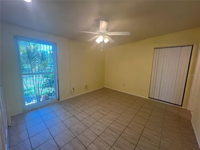 a view of an empty room and window