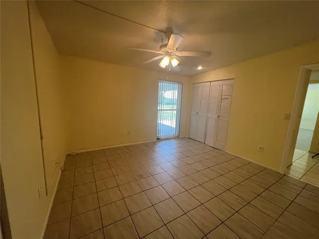 a view of an empty room and window