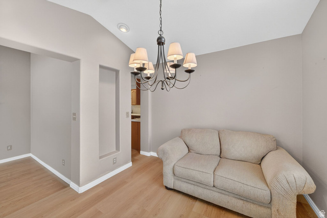 1464 990 West Provo, UT 84601 - Photo 9 of 41 Open area featuring light wood-finish flooring, a vaulted ceiling, and recessed lighting