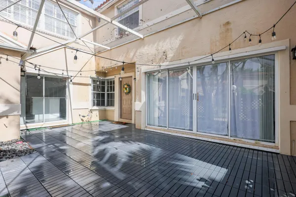 a view of a palm trees in front of a house