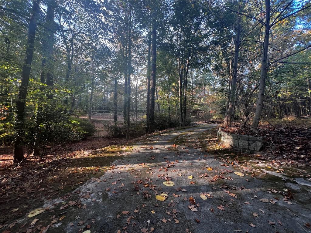 1340 West Garmon Road Northwest Sandy Springs, GA 30327 - Photo 7 of 9 a view of a field with trees in the background