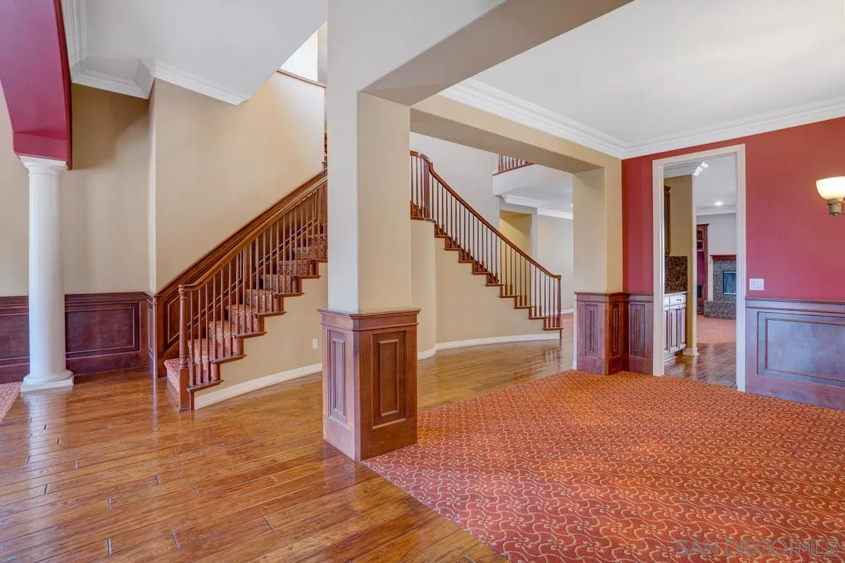 961 Red Granite Road Chula Vista, CA 91913 - Photo 3 of 27 a view of entryway and hall with wooden floor