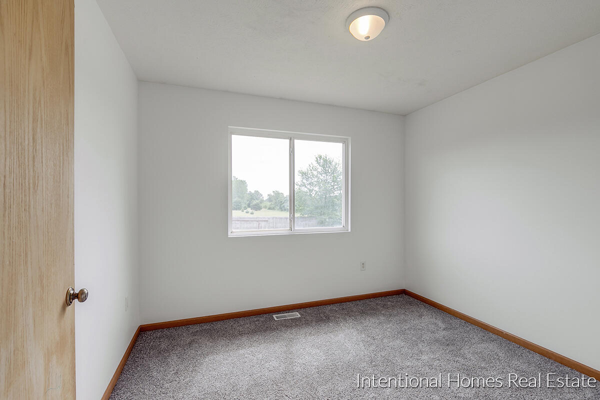 30 Daggett Road Sand Lake, MI 49343 - Photo 10 of 24 Bedroom 2 Main Floor