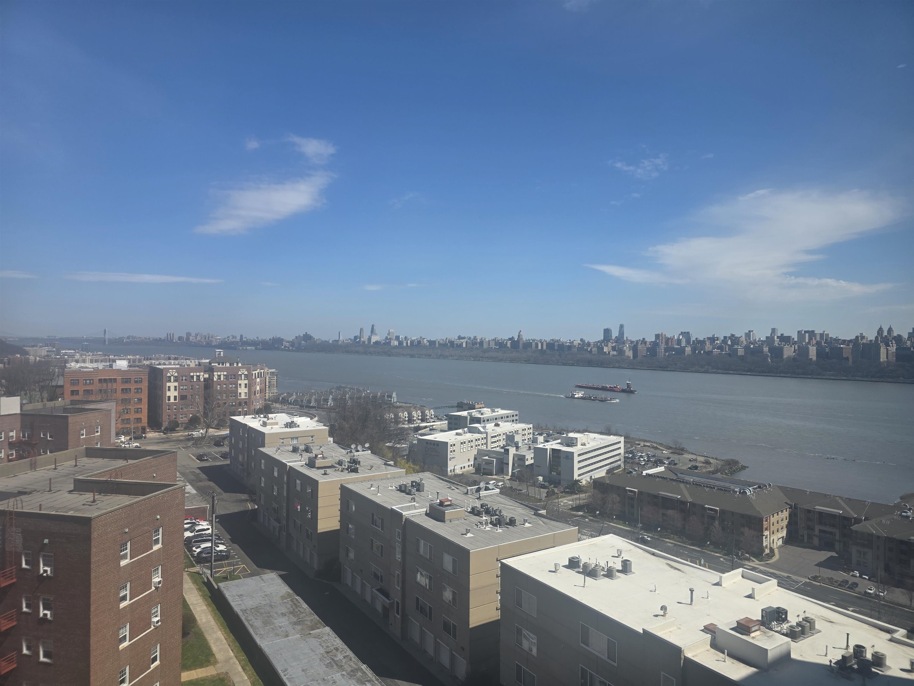 7100 Boulevard East, Unit 9R Guttenberg, NJ 07093 - Photo 16 of 19 a view of a terrace with furniture