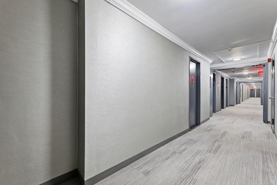 7100 Boulevard East, Unit 9R Guttenberg, NJ 07093 - Photo 6 of 19 a view of hallway with a lamp