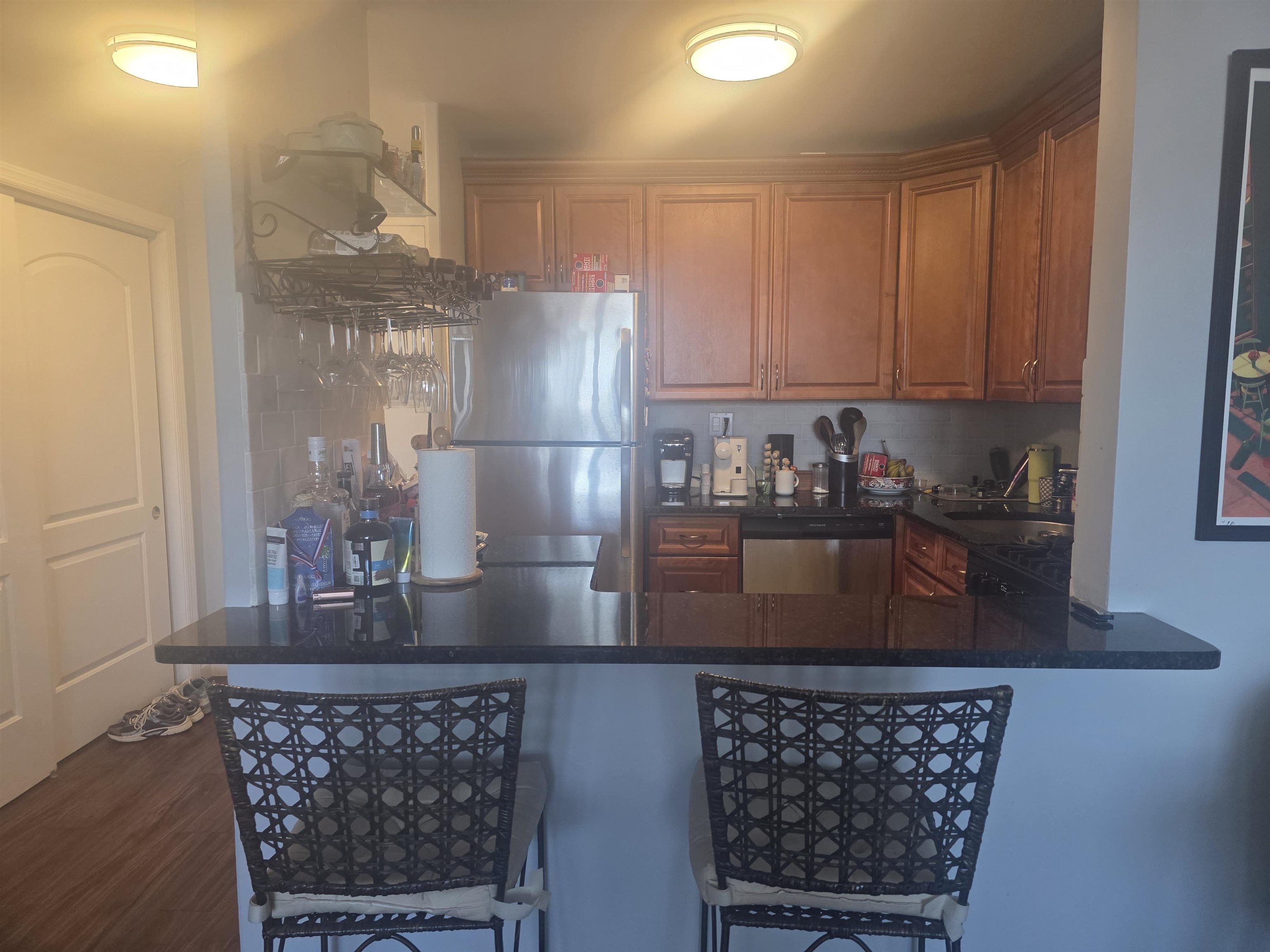 7100 Boulevard East, Unit 9R Guttenberg, NJ 07093 - Photo 10 of 19 a kitchen with stainless steel appliances granite countertop a refrigerator a stove and a cabinets