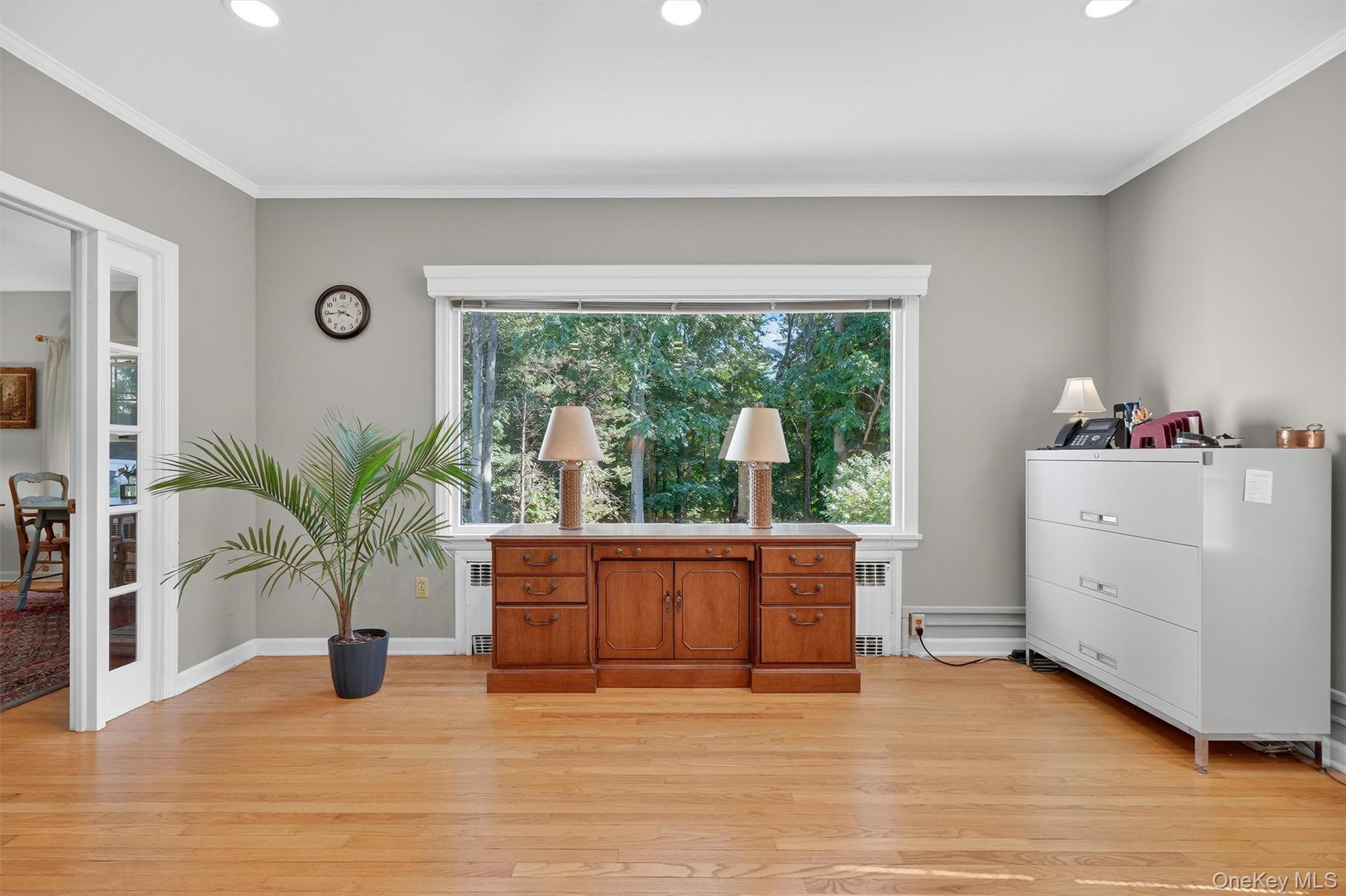 1436 Highway 52 Fishkill, NY 12524 - Photo 9 of 46 Living room with hardwood flooring, large windows and fireplace
