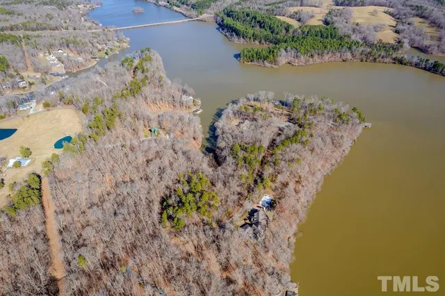 a view of lake with a trees in the background