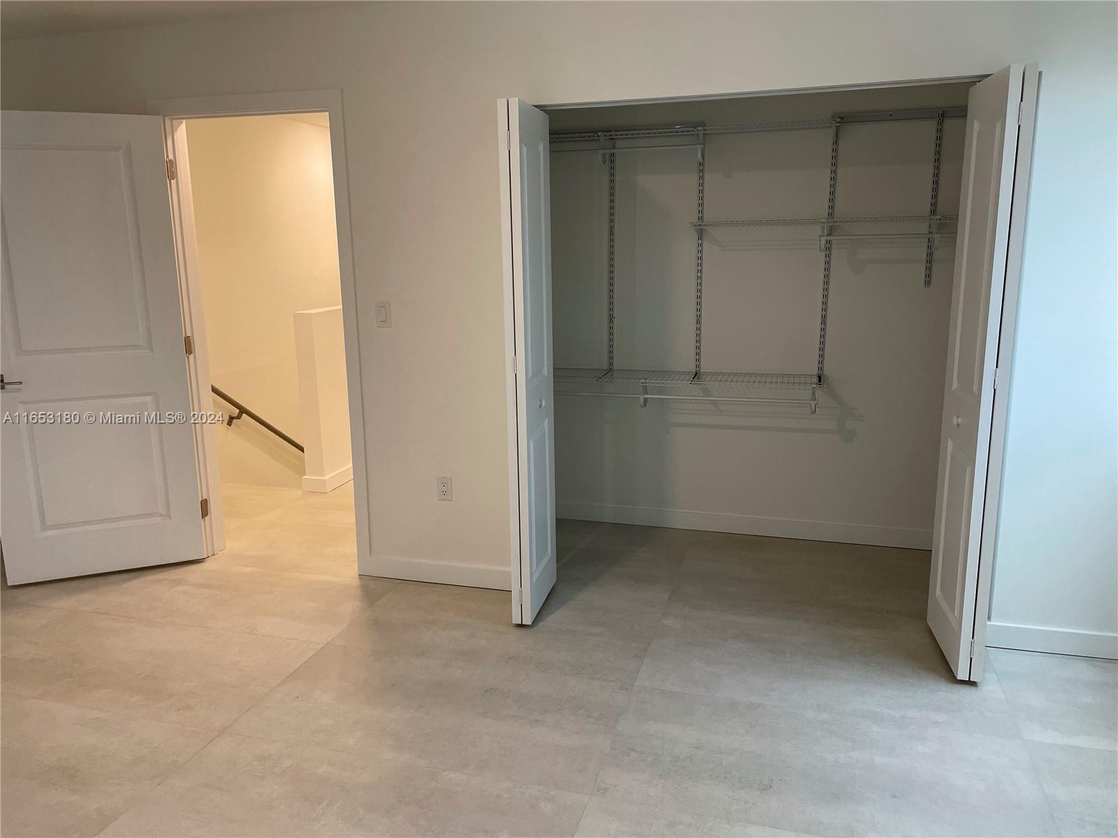 535 Southwest 5th Street, Unit 5 Miami, FL 33130 - Photo 15 of 19 an empty room with closet