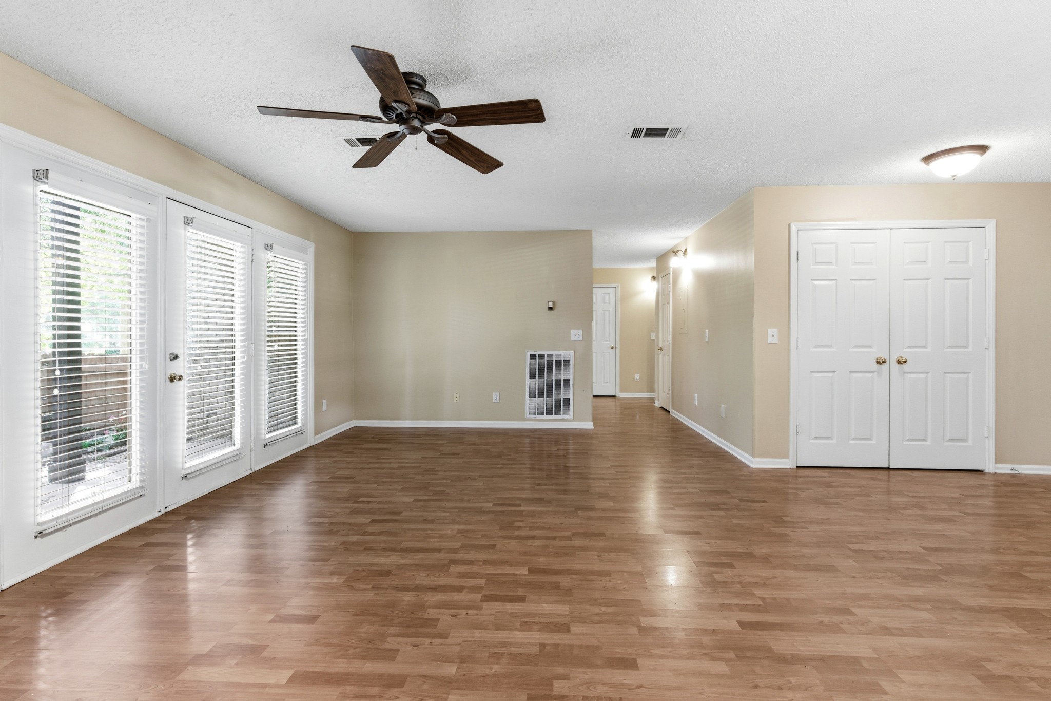 2009 Emery Lane Franklin, TN 37064 - Photo 11 of 39 a view of empty room with wooden floor and fan