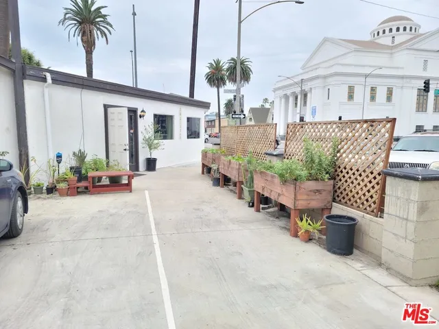 a bedroom with furniture and wooden floor
