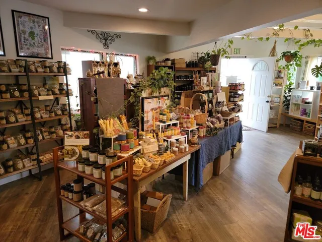 a room with wooden floor and window
