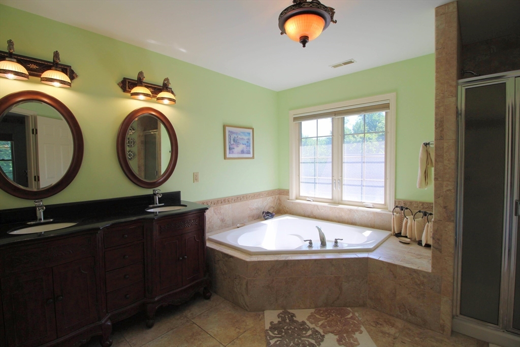 5 Gableview Lane Southwick, MA 01077 - Photo 28 of 41 a bathroom with a tub a sink and a mirror