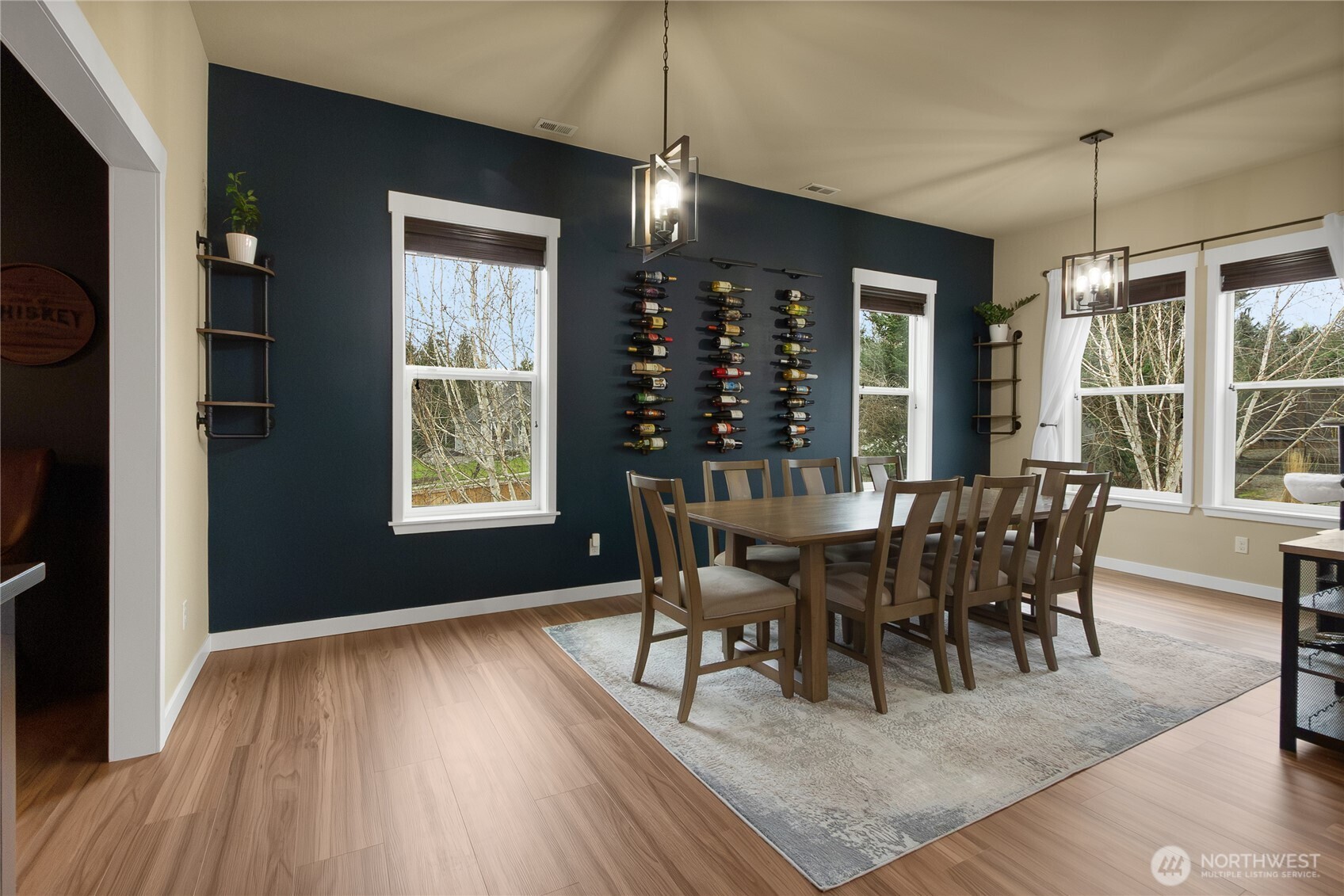 889 Lund Street Buckley, WA 98321 - Photo 3 of 25 a view of a dining room with furniture window and wooden floor