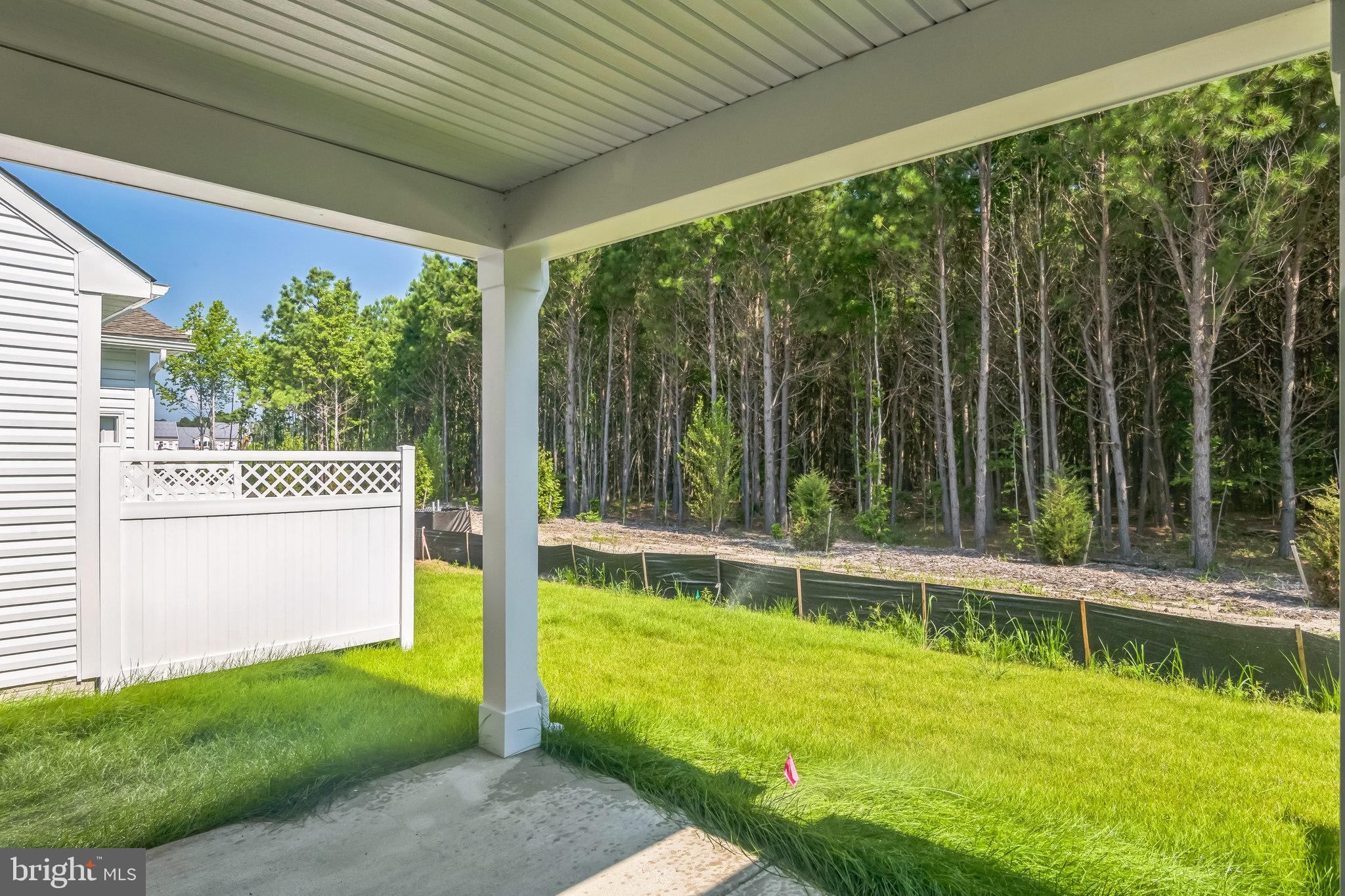 383 Scranton Lane Ocean View, DE 19970 - Photo 3 of 15 a view of a swimming pool with a yard