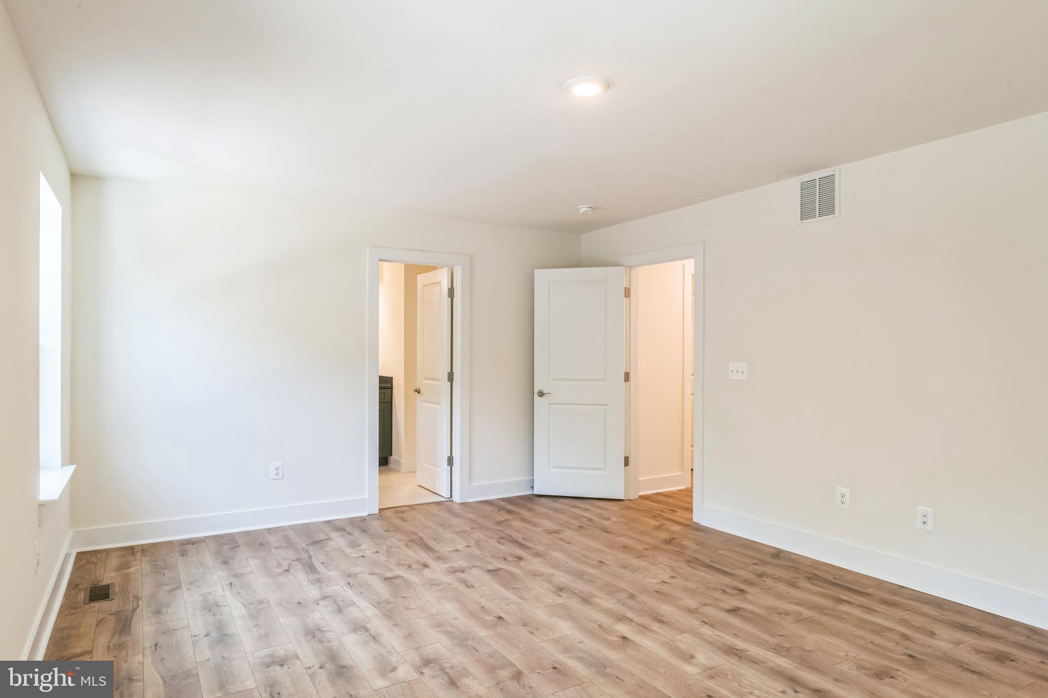 383 Scranton Lane Ocean View, DE 19970 - Photo 4 of 15 a view of an empty room with wooden floor