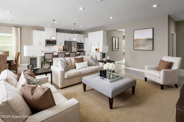 a living room with furniture and a couch