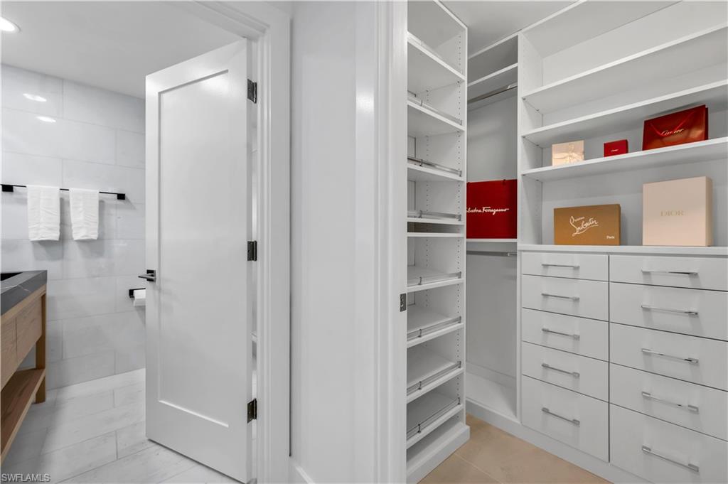 3777 Fountainhead Lane Naples, FL 34103 - Photo 8 of 18 a view of walk in closet