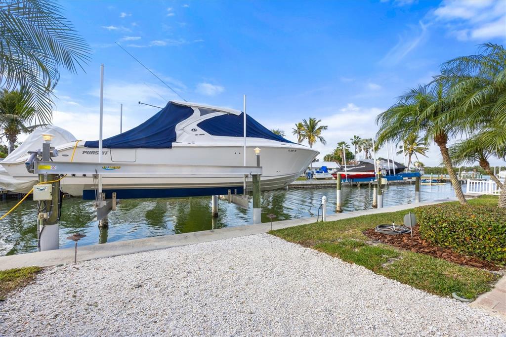 761 Norton Street Longboat Key, FL 34228 - Photo 57 of 66 a front view of a house with garden