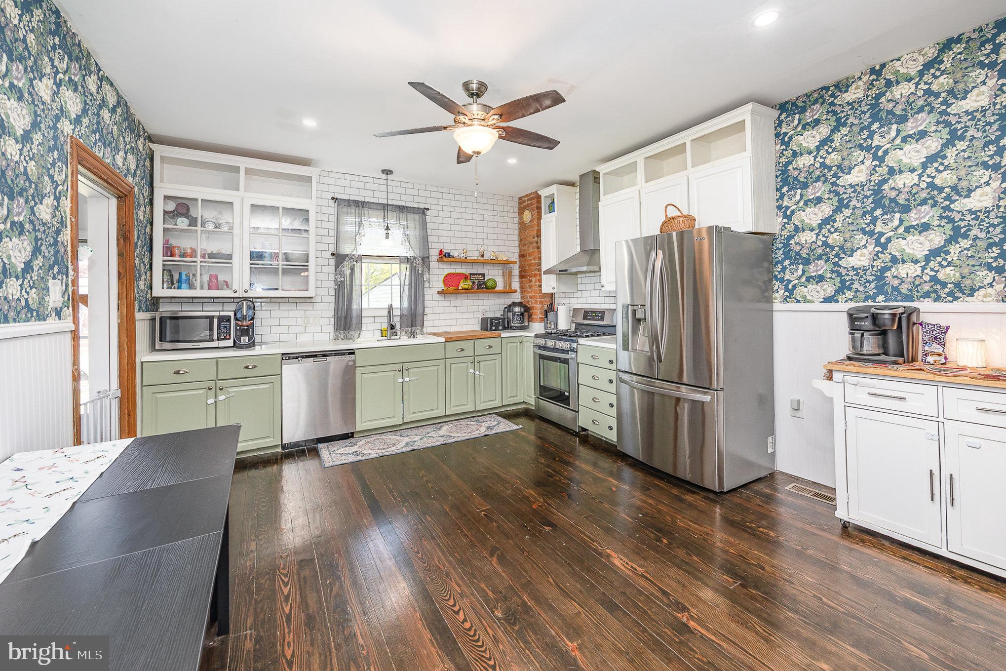 2527 South 3rd Street Steelton, PA 17113 - Photo 13 of 31 a kitchen with stainless steel appliances a refrigerator sink and cabinets