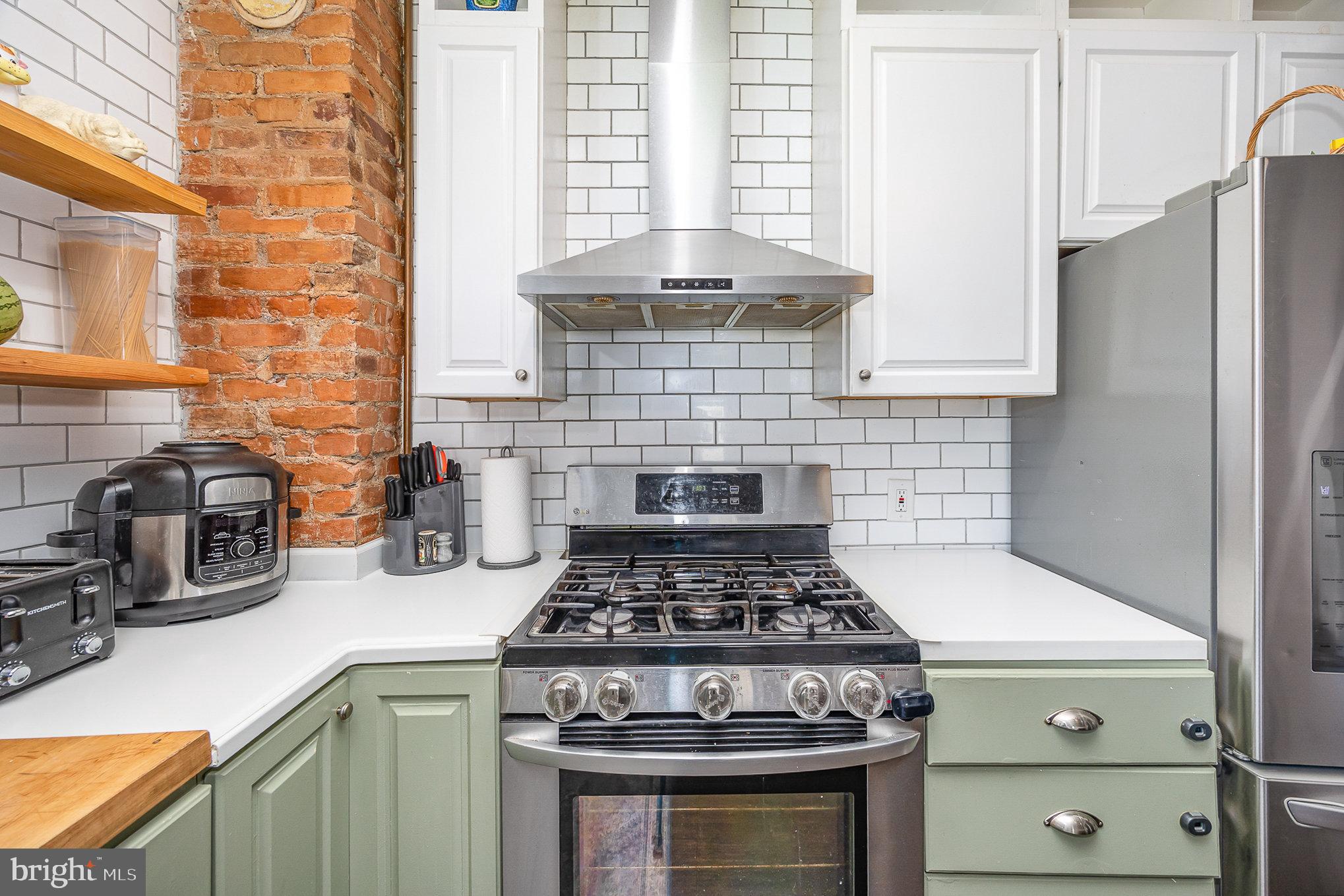 2527 South 3rd Street Steelton, PA 17113 - Photo 16 of 31 a stove top oven sitting inside of a kitchen