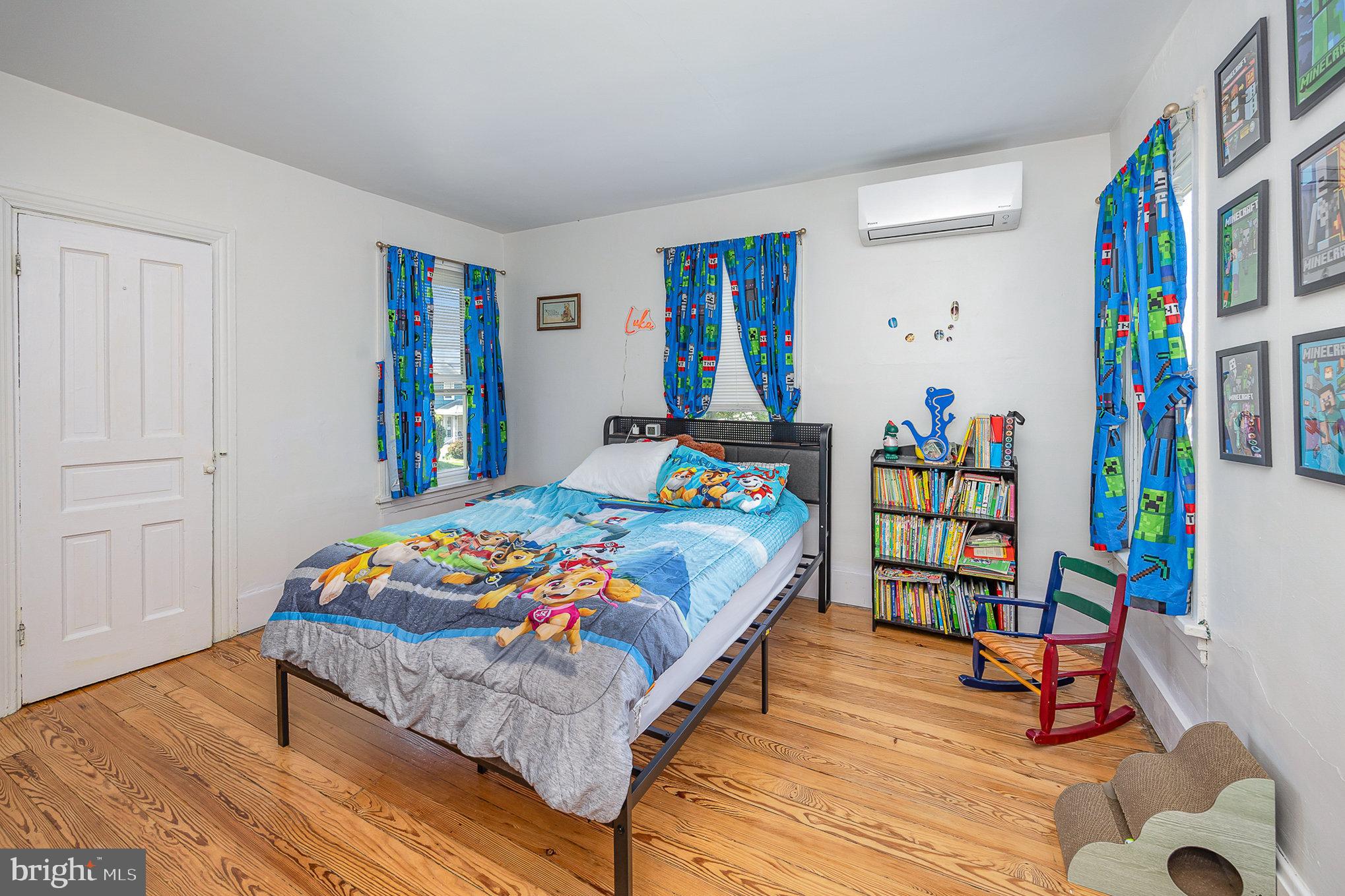2527 South 3rd Street Steelton, PA 17113 - Photo 20 of 31 a bedroom with bed and a book shelf