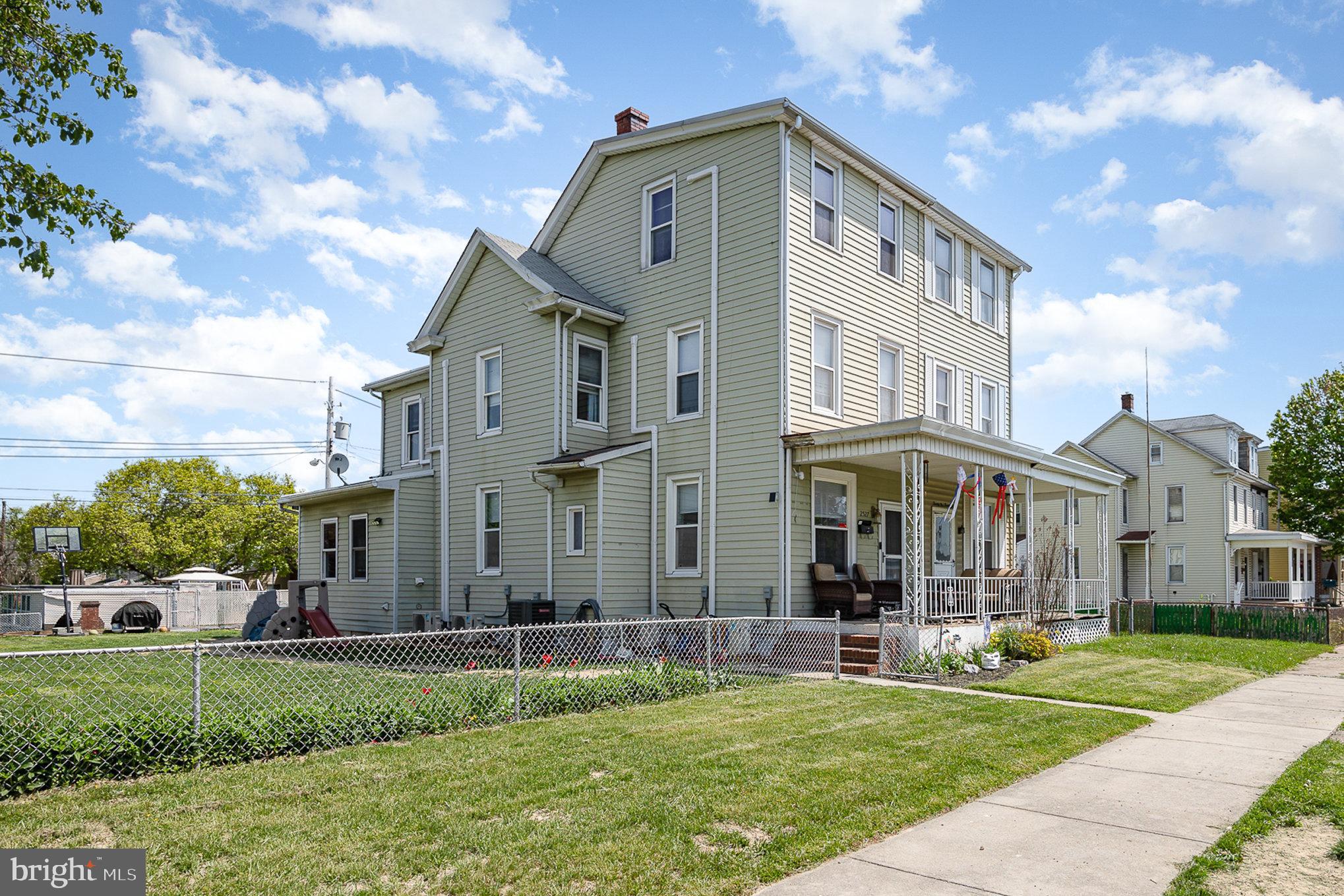 2527 South 3rd Street Steelton, PA 17113 - Photo 2 of 31 a front view of a house with a yard