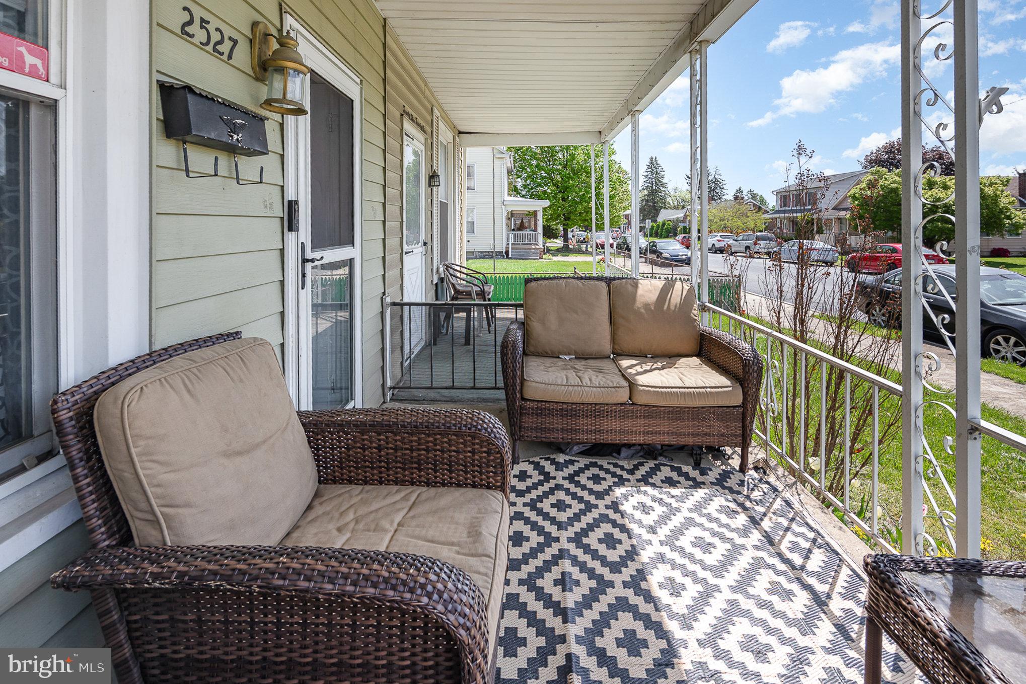 2527 South 3rd Street Steelton, PA 17113 - Photo 4 of 31 a balcony with chairs and outdoor view