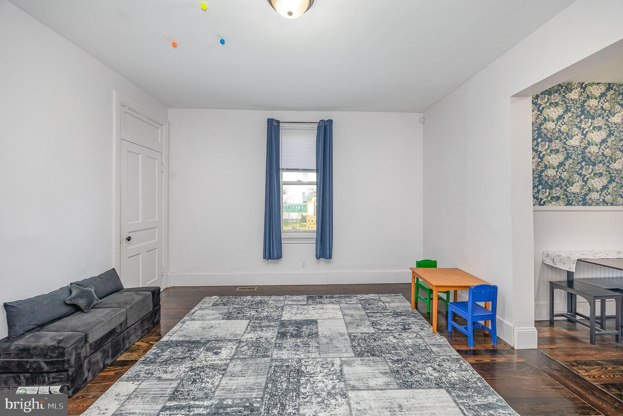 2527 South 3rd Street Steelton, PA 17113 - Photo 10 of 31 a living room with furniture and a window