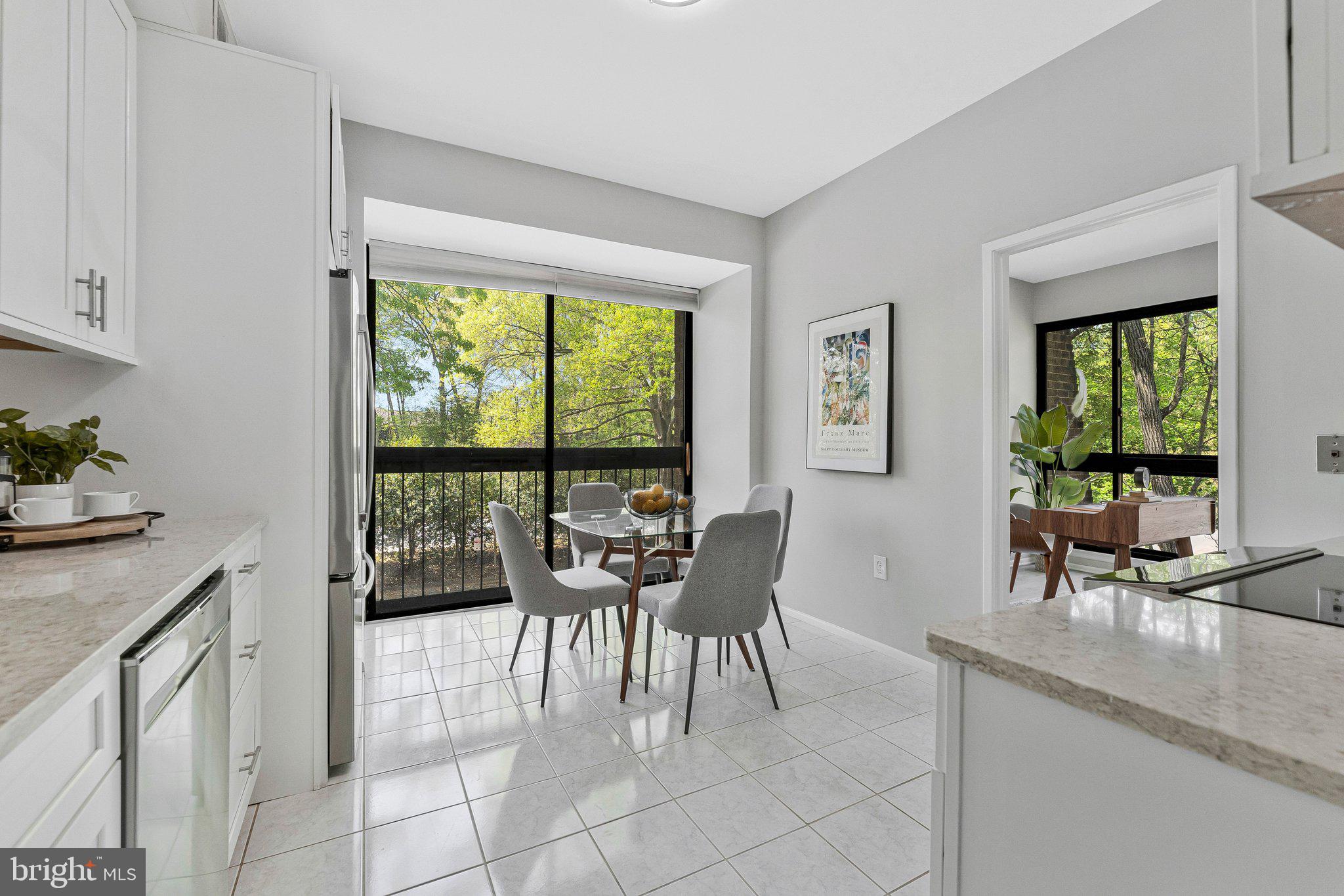 11616 Ivystone Court, Unit 5/300A Reston, VA 20191 - Photo 13 of 25 a dining room with furniture and large windows