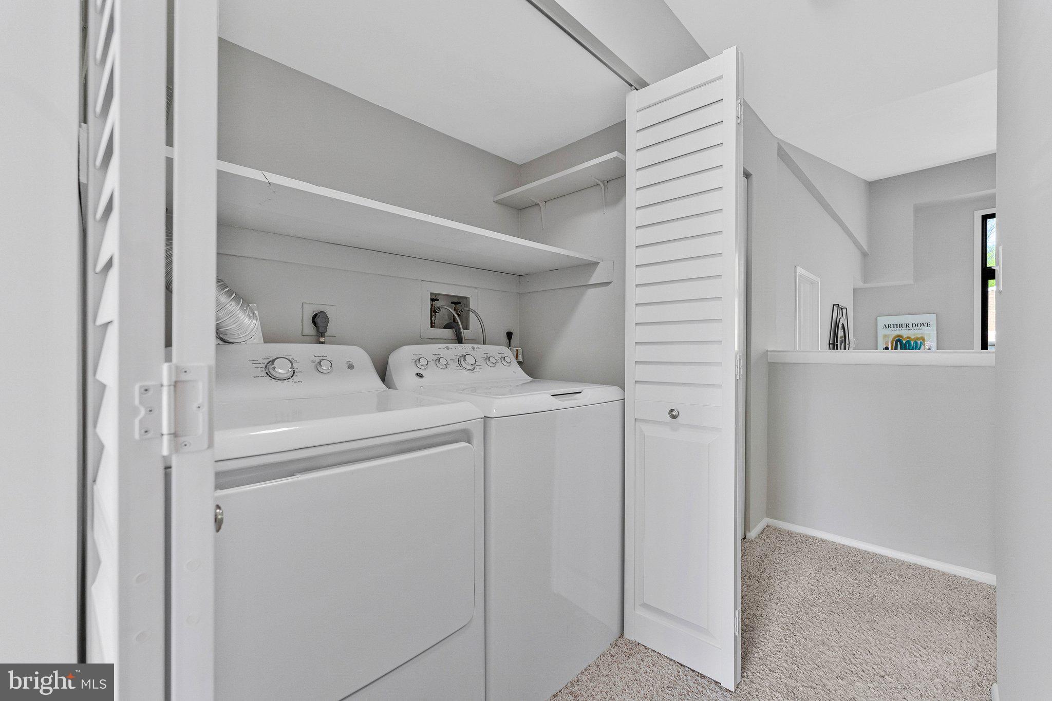 11616 Ivystone Court, Unit 5/300A Reston, VA 20191 - Photo 14 of 25 a utility room with dryer and washer