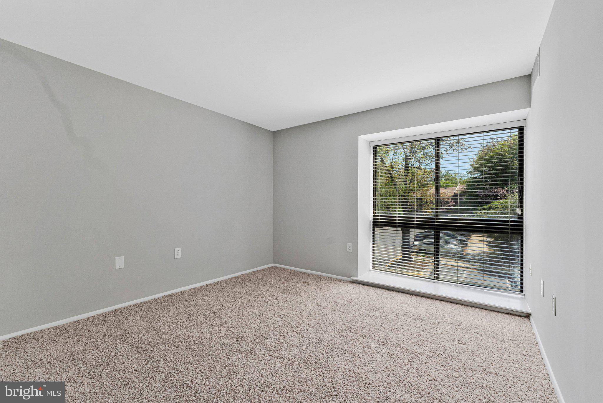 11616 Ivystone Court, Unit 5/300A Reston, VA 20191 - Photo 24 of 25 a view of an empty room with a window