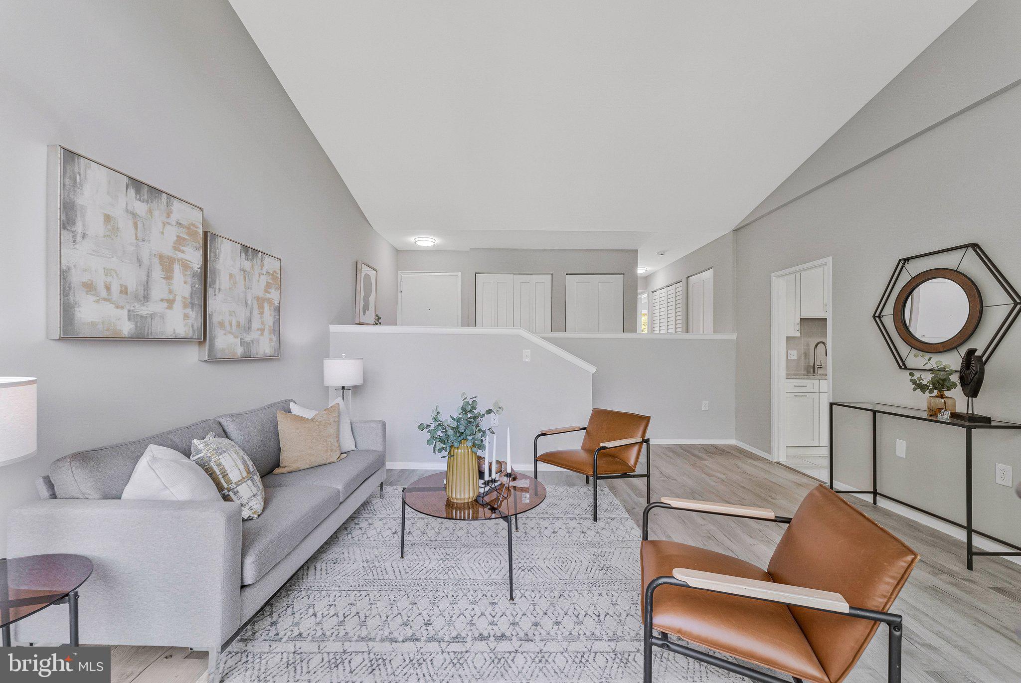 11616 Ivystone Court, Unit 5/300A Reston, VA 20191 - Photo 3 of 25 a living room with furniture