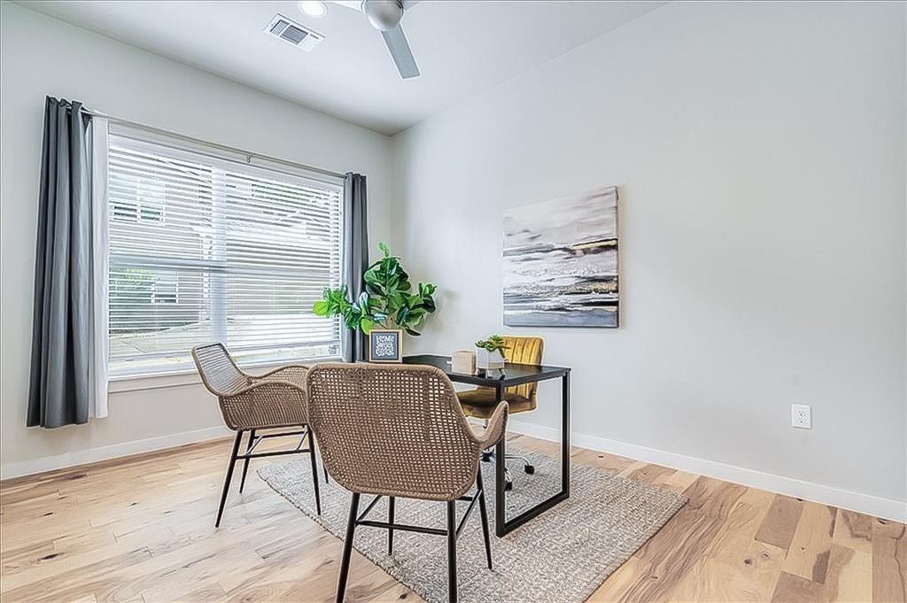 3913 Valley View Road, Unit B Austin, TX 78704 - Photo 11 of 24 a dining room with furniture and wooden floor