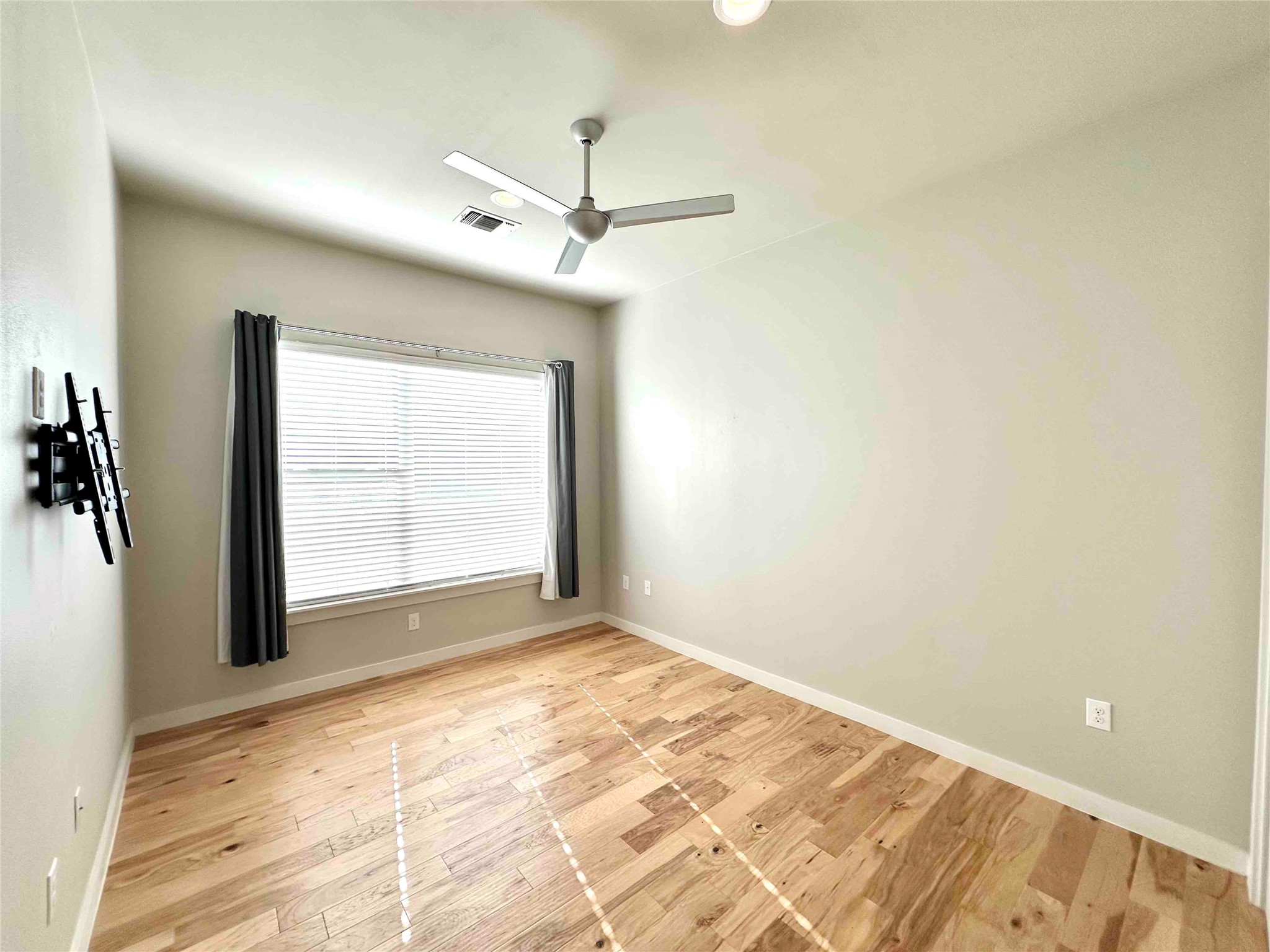 3913 Valley View Road, Unit B Austin, TX 78704 - Photo 18 of 24 a view of an empty room with a window