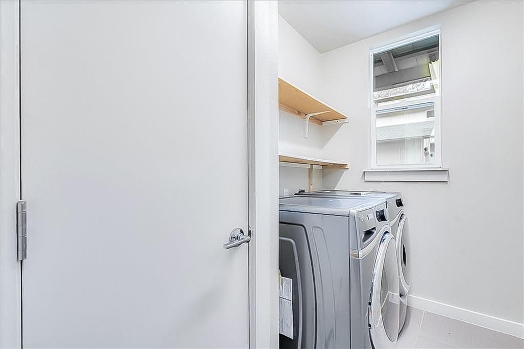 3913 Valley View Road, Unit B Austin, TX 78704 - Photo 19 of 24 a utility room with a sink dryer and washer