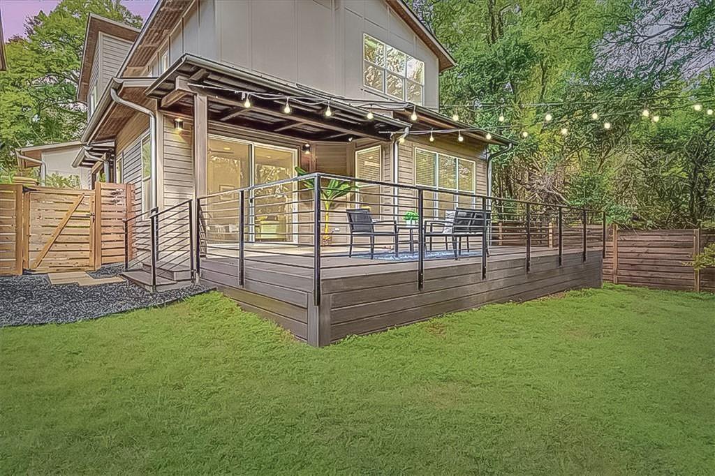 3913 Valley View Road, Unit B Austin, TX 78704 - Photo 22 of 24 front view of a house with a yard