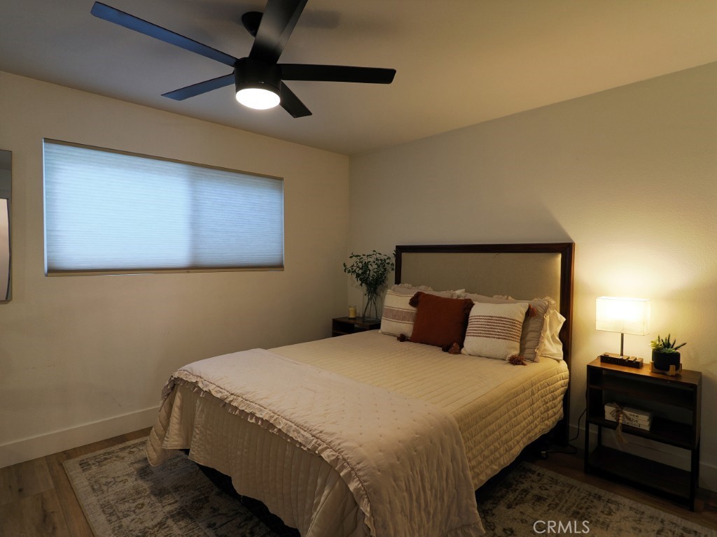 28596 North Bay Road Lake Arrowhead, CA 92352 - Photo 57 of 69 a bedroom with a bed and a ceiling fan