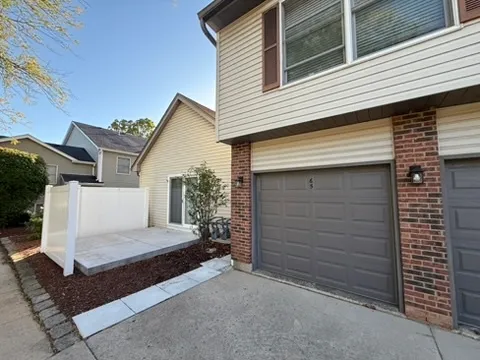 a view of a house with a garage