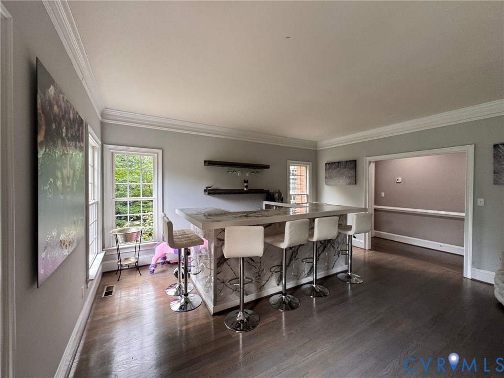 3231 Queens Grant Drive Midlothian, VA 23113 - Photo 17 of 48 a dining room with furniture and wooden floor